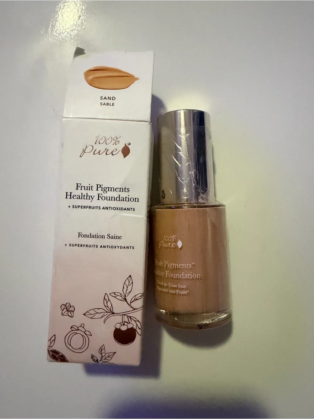 100% Pure Fruit Pigments Healthy Foundation — Pale Pink & White Packaging
